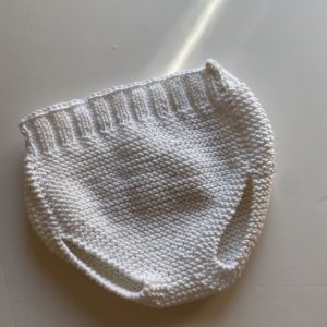 Cubrepañal tejido a mano